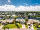 Bird's eye view of a canal-front house with a spacious lot and neighboring homes at 181 N Waterway Nw Dr, Port Charlotte, FL 33952