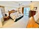Main bedroom with king-size bed, ample natural light, and ensuite bathroom access at 181 N Waterway Nw Dr, Port Charlotte, FL 33952