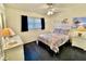 Bedroom with queen bed and decorative bedding at 181 N Waterway Nw Dr, Port Charlotte, FL 33952