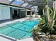 Inviting pool and spa area with lush landscaping at 181 N Waterway Nw Dr, Port Charlotte, FL 33952