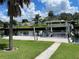 Private dock with lift on a calm canal at 181 N Waterway Nw Dr, Port Charlotte, FL 33952