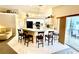 Kitchen with breakfast bar and view to living room at 181 N Waterway Nw Dr, Port Charlotte, FL 33952