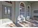 Inviting front entrance with double doors and sidelights at 3589 Pennyroyal Rd, Port Charlotte, FL 33953