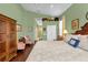 King-size bed, walk-in closet, and sitting area in the main bedroom at 3589 Pennyroyal Rd, Port Charlotte, FL 33953