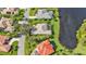 Aerial view of property with canal front location at 3589 Pennyroyal Rd, Port Charlotte, FL 33953