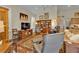 Bright living room featuring hardwood floors and built-in shelving at 3589 Pennyroyal Rd, Port Charlotte, FL 33953