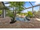 Enjoy this relaxing pool area with a waterfall feature at 3589 Pennyroyal Rd, Port Charlotte, FL 33953