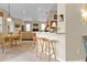 Kitchen breakfast nook with a round table and chairs, adjacent to the kitchen at 3589 Pennyroyal Rd, Port Charlotte, FL 33953