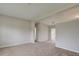 Bright living room with neutral colored carpet at 2513 Elkcam Blvd, Port Charlotte, FL 33952