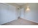 Bedroom with double door closet and carpet at 2513 Elkcam Blvd, Port Charlotte, FL 33952