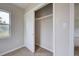 Spacious closet with a sliding door and shelving at 2513 Elkcam Blvd, Port Charlotte, FL 33952