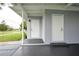 Carport with exterior storage and access to backyard at 2513 Elkcam Blvd, Port Charlotte, FL 33952