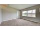 Spacious bedroom with neutral wall paint and carpeted floors at 2513 Elkcam Blvd, Port Charlotte, FL 33952