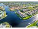 Aerial view of waterfront property and surrounding canals and community at 3800 Bal Harbor # 414, Punta Gorda, FL 33950