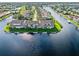 Aerial view of waterfront community with boat access and lush landscaping at 3800 Bal Harbor # 414, Punta Gorda, FL 33950