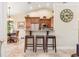 Kitchen with breakfast bar and seating for three at 3800 Bal Harbor # 414, Punta Gorda, FL 33950