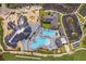 Aerial view of community pool and clubhouse at 15903 Grassland Ln # 4421, Punta Gorda, FL 33982