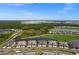 Aerial view of luxury homes and a golf course at 15903 Grassland Ln # 4421, Punta Gorda, FL 33982