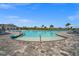 Resort-style pool with lounge chairs and patio area at 15903 Grassland Ln # 4421, Punta Gorda, FL 33982