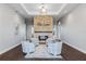Community room with fireplace and comfortable seating at 15952 Crofton Springs Way, Port Charlotte, FL 33953