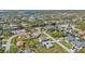 Aerial view showcasing the home's waterfront location and neighborhood at 17341 Sabrina Cir, Port Charlotte, FL 33948