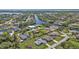 Aerial view of a waterfront community with lush greenery at 17341 Sabrina Cir, Port Charlotte, FL 33948