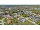 Aerial view of canal-front homes and neighborhood at 17341 Sabrina Cir, Port Charlotte, FL 33948