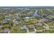 Aerial view of waterfront homes with lush landscaping and canals at 17341 Sabrina Cir, Port Charlotte, FL 33948