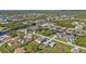 Aerial view of a waterfront community with many houses and canals at 17341 Sabrina Cir, Port Charlotte, FL 33948