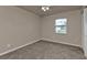 Spacious bedroom with neutral walls and carpet flooring at 17341 Sabrina Cir, Port Charlotte, FL 33948