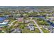 Aerial view shows a waterfront property with surrounding houses at 17341 Sabrina Cir, Port Charlotte, FL 33948