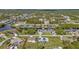 Aerial view of houses and canals in a residential area at 17341 Sabrina Cir, Port Charlotte, FL 33948