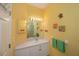 Small bathroom with single vanity and yellow walls at 1274 White Oak Trl, Port Charlotte, FL 33948