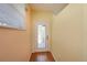 Interior entryway with light wood floors at 1274 White Oak Trl, Port Charlotte, FL 33948