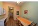 View of dining area, hallway, and built-in desk at 1274 White Oak Trl, Port Charlotte, FL 33948