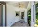 Covered patio with tiled floor and ceiling fan at 1274 White Oak Trl, Port Charlotte, FL 33948