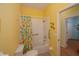 Bathroom with tub, shower, and colorful curtain at 1274 White Oak Trl, Port Charlotte, FL 33948