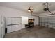 Garage with workbench, generator, and storage cabinets at 1274 White Oak Trl, Port Charlotte, FL 33948