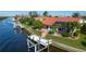 Stunning waterfront property with private dock and lush landscaping at 2831 Deborah Dr, Punta Gorda, FL 33950