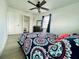 Bedroom with queen bed, dresser, and spacious closet at 14300 Worthwhile Rd, Port Charlotte, FL 33953