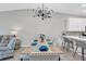 Bright dining area with farmhouse table and seating for six at 14214 Heritage Landing Blvd # 821, Punta Gorda, FL 33955