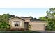 Single-story home with neutral color scheme and landscaping at 15952 Crofton Springs Way, Port Charlotte, FL 33953