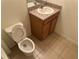 Simple bathroom with single vanity and tiled floor at 7633 W Lenox Cir, Punta Gorda, FL 33950