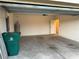 Attached garage with concrete floor and interior access at 7633 W Lenox Cir, Punta Gorda, FL 33950