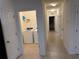 Laundry room with washer, dryer, and built-in shelving at 7633 W Lenox Cir, Punta Gorda, FL 33950