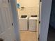 Bright laundry room complete with washer and dryer at 7633 W Lenox Cir, Punta Gorda, FL 33950