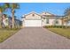 Two-car garage and manicured landscaping at 1530 Laurel Brook Ln, Port Charlotte, FL 33953