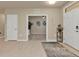 Spacious entryway with light flooring and views into the living area at 1530 Laurel Brook Ln, Port Charlotte, FL 33953