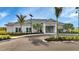 Modern clubhouse with ample parking and attractive landscaping at 1530 Laurel Brook Ln, Port Charlotte, FL 33953