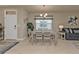 Dining area with table and chairs near the entryway at 1530 Laurel Brook Ln, Port Charlotte, FL 33953
